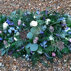 Lots of Greenery and a few Flowers