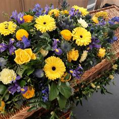 Yellow and Blue Casket Spray with Garland
